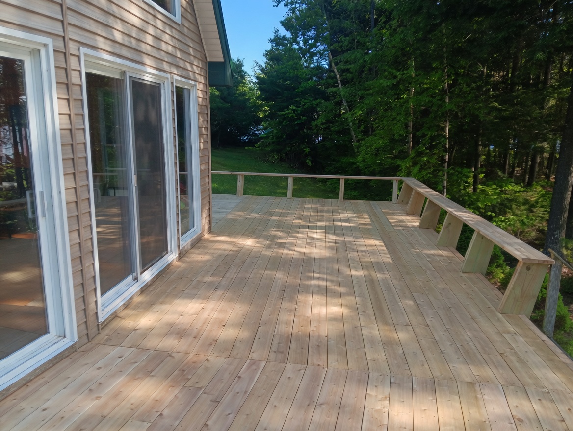 Wide deck with sliding glass door access
